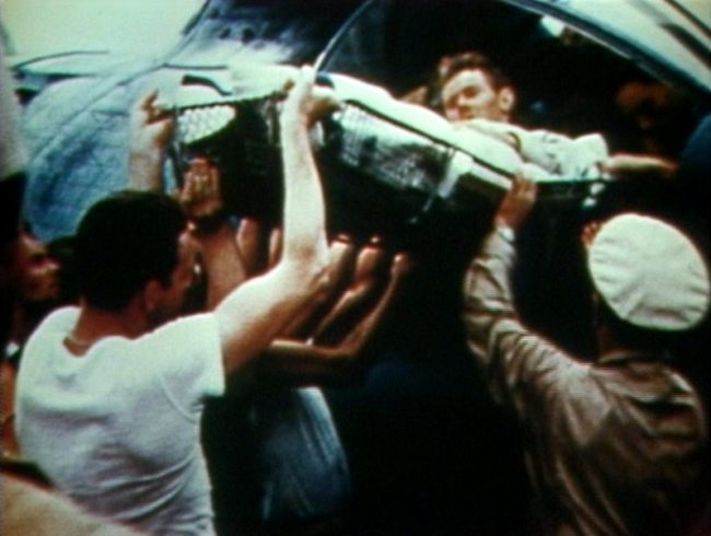 A rescued U.S. airman on Midway.